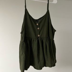 Green and black tank top shirts